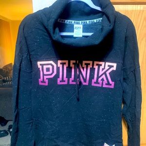Women’s Pink Pullover. Color is Black speckled size large
